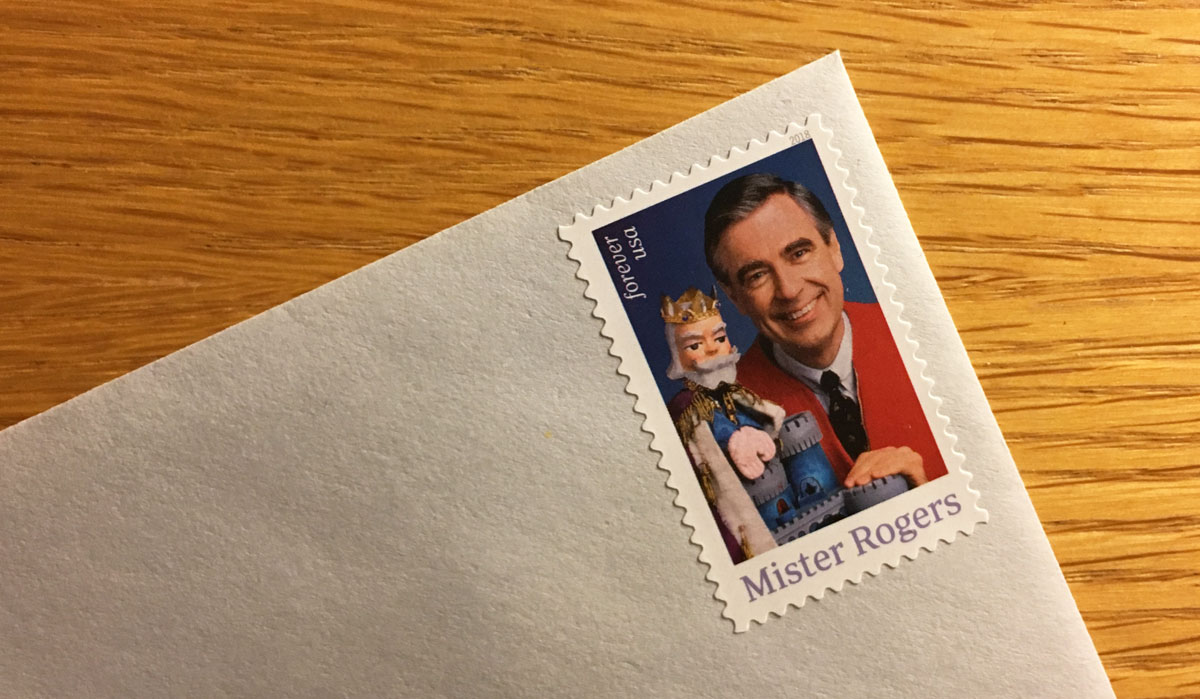 the corner of an envelope with a postage stamp