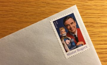 the corner of an envelope with a postage stamp
