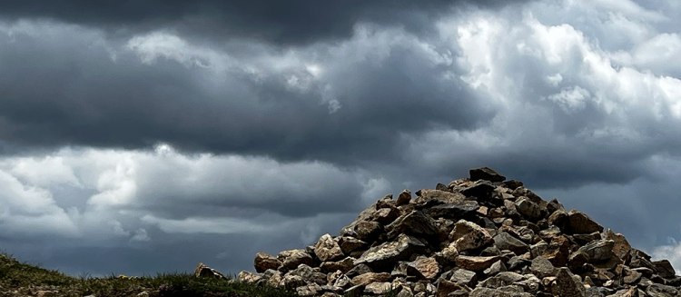 Storm clouds above a mountain top